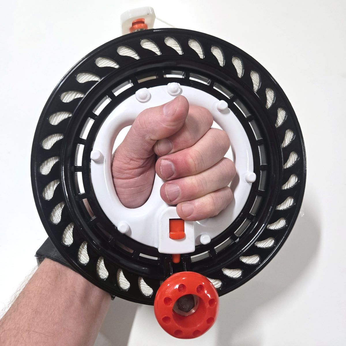 BruteLine 150m fully spooled winder held in one hand by the grip handle