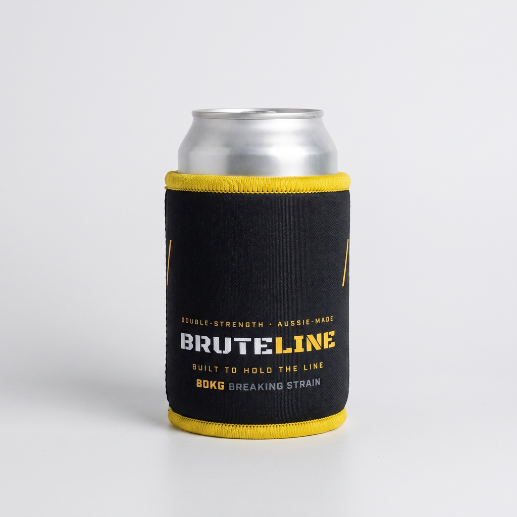 BruteLine magnetic stubbie cooler in black neoprene with yellow trim, holding a can on a clean studio background